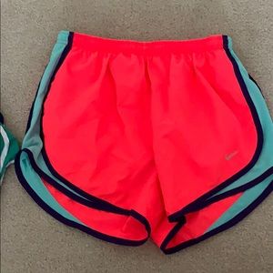 Bright pink Nike shorts